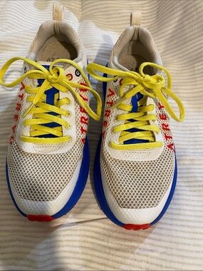 Kids White Sneakers with Blue Accents and Yellow Laces